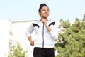 Healthy young woman running outdoors in the city Royalty Free Stock Photo