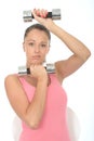 Healthy Young Woman Stressing While Training With Weights Royalty Free Stock Photo