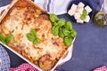 Healthy zucchini lasagna bolognese in a baking dish.Oven baked traditional Italian cuisine with mozzarella, parmesan Royalty Free Stock Photo