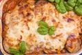 Healthy zucchini lasagna bolognese in a baking dish.Oven baked traditional Italian cuisine with mozzarella, parmesan Royalty Free Stock Photo