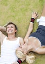 Healthylife Concept: Young Couple of tennis Players Resting On T