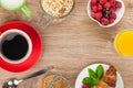 Healty breakfast with muesli, berries, orange juice, coffee and Royalty Free Stock Photo