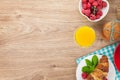 Healty breakfast with muesli, berries, orange juice, coffee and Royalty Free Stock Photo