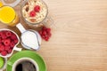 Healty breakfast with muesli, berries, orange juice, coffee and Royalty Free Stock Photo