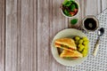 Healty grilled cheese sandwich with grape and cup of coffee Royalty Free Stock Photo