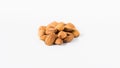 heap of almonds on a white background