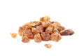 Heap of amber sugar on white Royalty Free Stock Photo