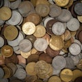 A heap of assorted coins of varying sizes and denominations created with Generative AI technology