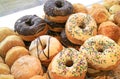 Heap of assorted doughnuts on the shelf of a bakery shop Royalty Free Stock Photo