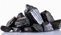 Heap of black coal chunks isolated on white background