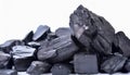 Heap of black coal chunks isolated on white background