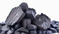 Heap of black coal chunks isolated on white background