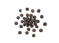 Heap of black pepper isolated on white background, macro, top view Royalty Free Stock Photo