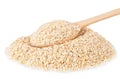 Heap of bran with wooden spoon