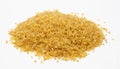 Heap of bulgur wheat groats isolated