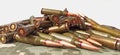 Heap of bullets against white background. Military concept. War for freedom Royalty Free Stock Photo