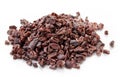 Heap of cacao nibs on white background