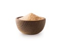 Heap of cane sugar isolated on white background. Heap of brown sugar on white background. Wooden bowl of dark sugar isolated on wh Royalty Free Stock Photo