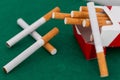 Heap of cigarettes on black background. Close up. Royalty Free Stock Photo