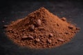 Heap of cocoa powder with cocoa beans Royalty Free Stock Photo