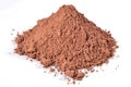 Heap of cocoa powder on a white Royalty Free Stock Photo