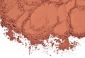 Heap of cocoa powder on a white Royalty Free Stock Photo