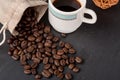 Heap coffe beans and cup of fresh coffee Royalty Free Stock Photo