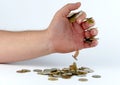 Heap of coins in the hand Royalty Free Stock Photo