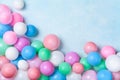 Heap of colorful balloons on blue pastel table top view. Birthday or party background. Flat lay. Copy space for text Royalty Free Stock Photo