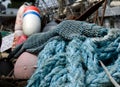Heap of colorful lobster buoys and fishnet Royalty Free Stock Photo