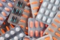 Heap of colorful medical pills in blister packaging