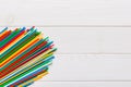 Heap of colorful plastic drinking straws on Colored background, flat lay. Copy Space for text Royalty Free Stock Photo