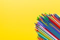 Heap of colorful plastic drinking straws on Colored background, flat lay. Copy Space for text Royalty Free Stock Photo