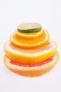Heap of colorful slices citrus fruits close up