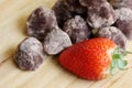 Heap of confectionery - chocolate truffle and strawberry