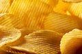 Heap of corrugated potato chips background Royalty Free Stock Photo