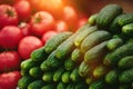 Heap of cucumbers and tomatoes at Farmers` market Royalty Free Stock Photo