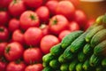 Heap of cucumbers and tomatoes at Farmers` market Royalty Free Stock Photo