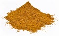 Heap of curry powder on a white Royalty Free Stock Photo