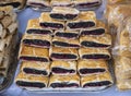 Heap of delicoius strudel stuffed with poppy apfel and cherry Royalty Free Stock Photo