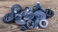 Heap of different gears on wood Royalty Free Stock Photo