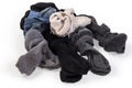 Heap of different used washed socks pairs on white background