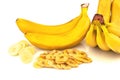 Heap of dried banana chips with banana bunch