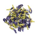 Heap of dried butterfly pea tea flowers close up on white background Royalty Free Stock Photo