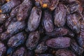 Heap of dried dates close-up.