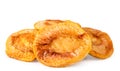 Heap of dried peaches on a white, isolated.