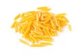 Heap of dried, raw, uncooked penne pasta Royalty Free Stock Photo