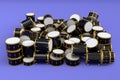 Heap of drums or drumset lying on violet background