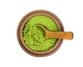Heap of dry young barley or wheat grass powder in a bowl isoolated. Royalty Free Stock Photo