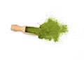 Heap of dry young barley or wheat grass powder in a wooden spoon isoolated. Royalty Free Stock Photo